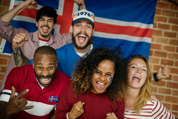 istock Friends cheering world cup with painted flag 1062021606