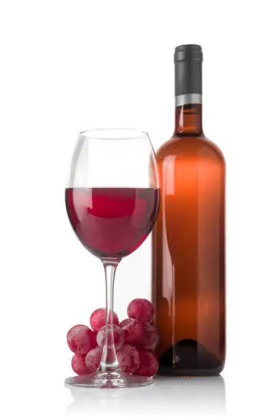 Red wine,bottle and grape on the white background