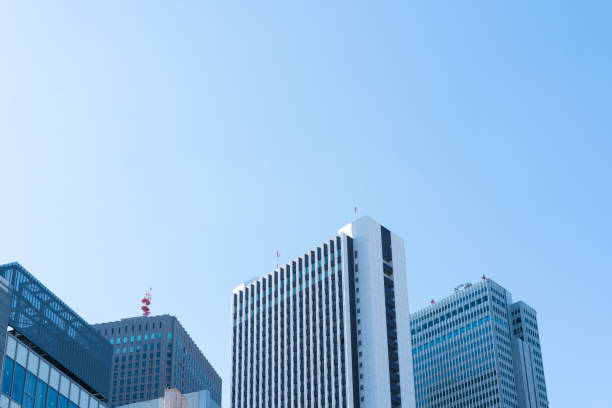 istock Business image -  Office building against the blue sky 1062028914