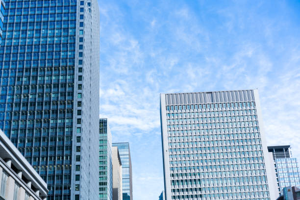 istock Business image -  Office building against the blue sky 1062028990