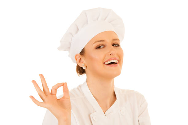 istock Beautiful young chef woman gestures excelent isolated over white background 1062032828