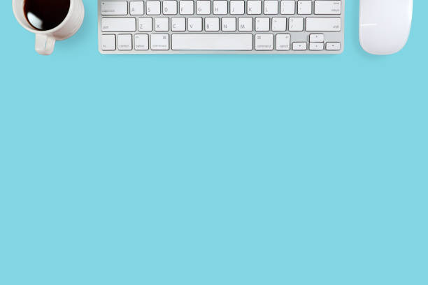 istock workspace business desk with computer and coffee on blue pastel background 1062033404