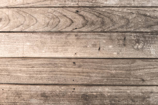 istock Wood table floor with natural pattern texture. Empty template  wood board can be used as background. 1062035962