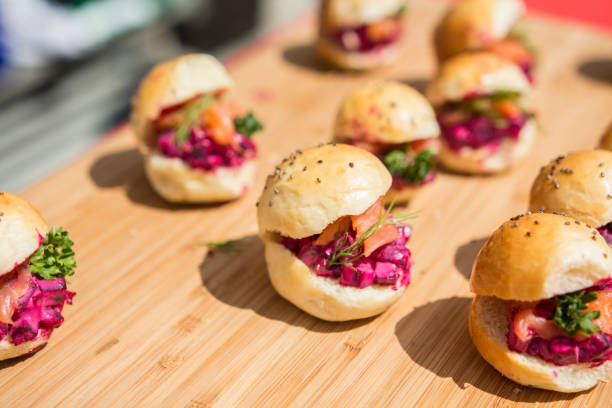 In the photography are canape with root dip and smoked salmon with dill. This finger food is suitable for snack, buffet or as an appetizer. Also it is great food for party. It is very popular in Scandinavia and also in Japan.