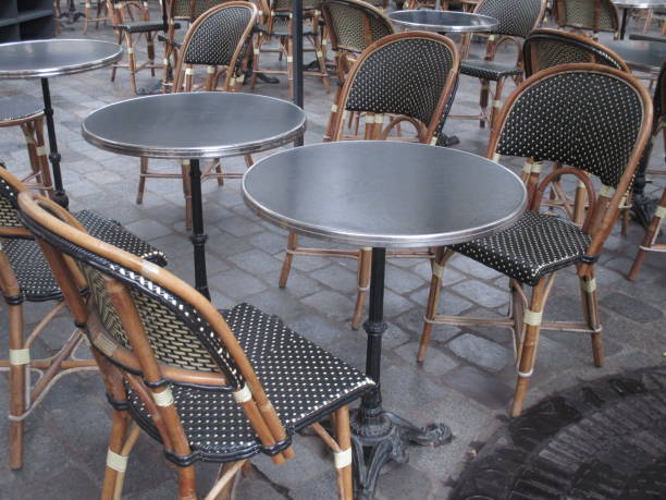 istock Restaurant cafe terrace  Round table and rattan armchair 1062053114