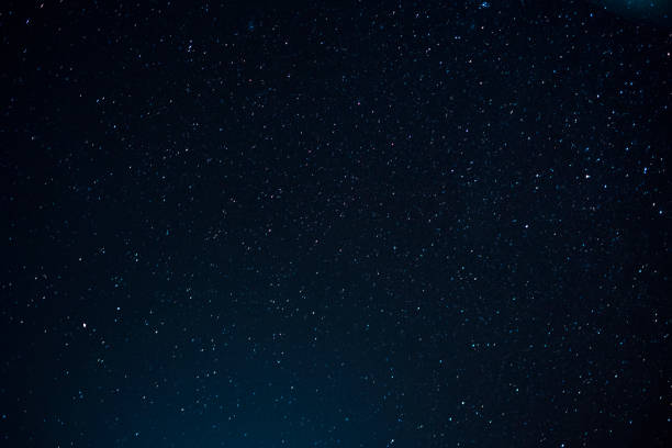 istock Night scape with beautiful stary sky at the high mountain. Star texture. Space background. 1062055896