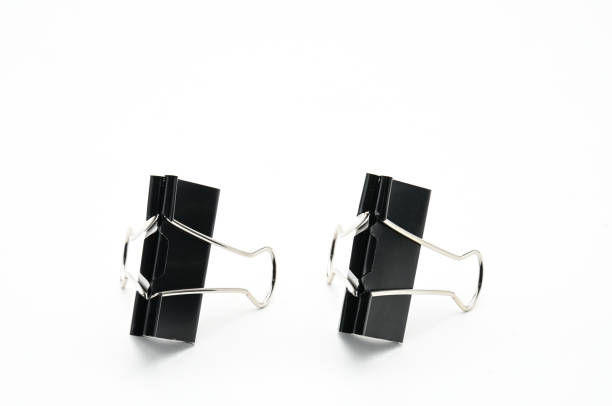 istock Binder clips paper clamp on an isolated background 1062056438