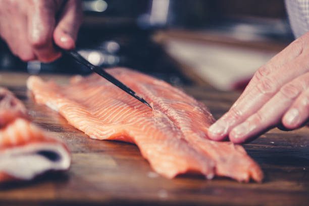 istock Preparing salmon for filleting. 1062058072