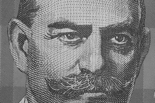 Close up on Australian dollar banknotes. Portrait Black and white of JOHN MONASH on 100AUD Banknotes. Shooting by 1:1 Macro lense.;