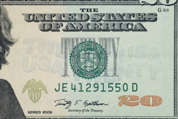 istock Close up on US dollar banknotes. U.S. Federal reserve system on US Dollar banknotes. Shooting by 1:1 Macro lense. 1062064732