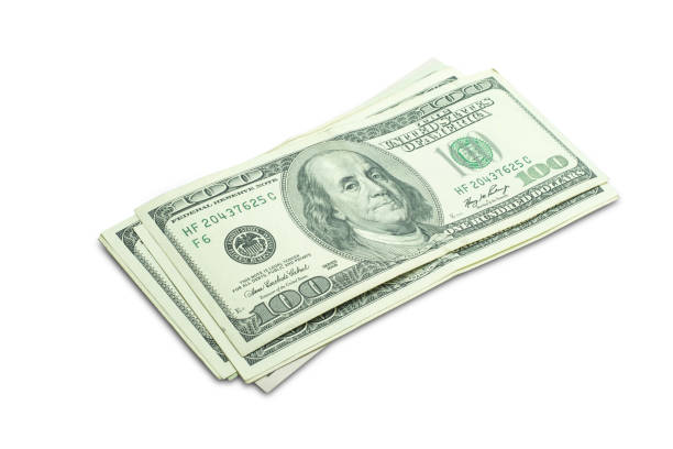 istock A group of banknotes isolated on white background with clipping path. 1062064884