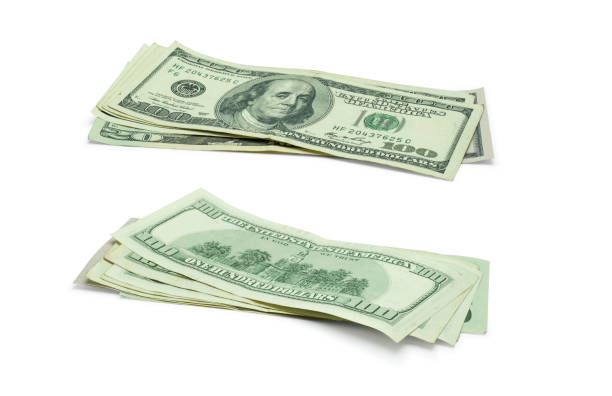 istock A group of banknotes isolated on white background with clipping path. 1062064910