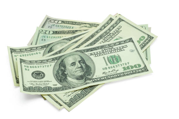 istock A group of banknotes isolated on white background with clipping path. 1062064934
