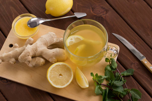 istock making lemon tea with ginger and honey 1062067058