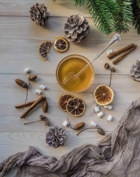istock autumn still life with honey, marshmallows, pine and cones, lemo 1062069246