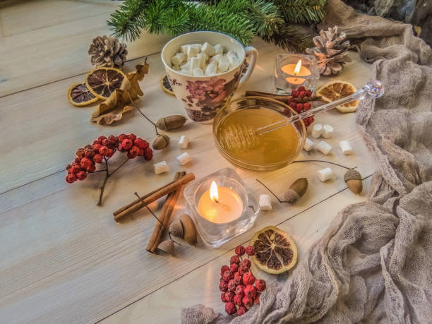istock autumn still life with honey, Rowan, marshmallows, pine and cones 1062070914