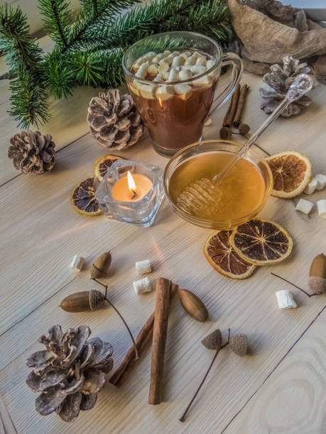 istock autumn still life with honey, marshmallows, pine and cones 1062071014