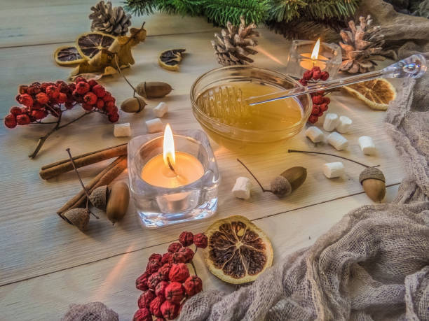 istock autumn still life with honey, Rowan, marshmallows, pine and cones 1062078442
