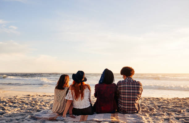 istock Looking at beautiful sunsets with beautiful people 1062084396