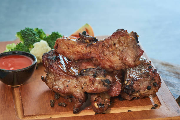 istock Grilled Barbecue Pork Ribs With Pepers 1062089374