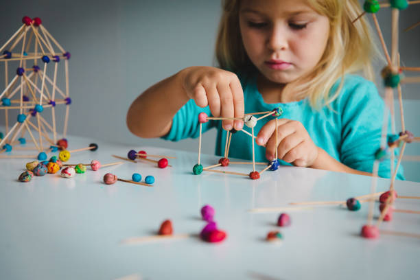istock child making geometric shapes, engineering and STEM 1062089860