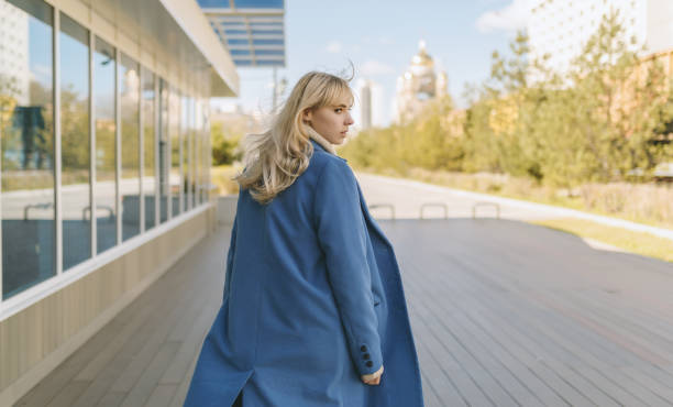 istock Woman wearing blue coat. 1062090852