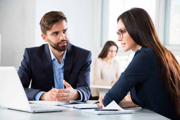 istock Businesspeople discuss a new project 1062097750