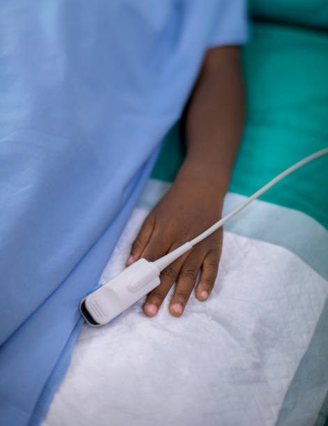 istock Midsection of ill boy with pulse oxymeter on bed 1062100004