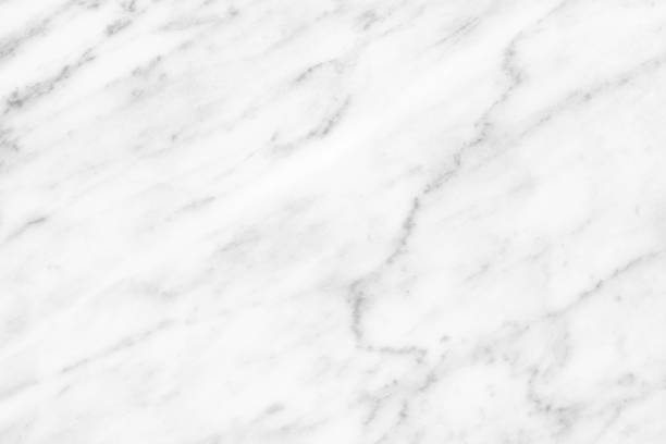 istock White Carrara Marble natural light surface for bathroom or kitchen countertop 1062103280
