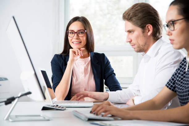 istock Business woman and her colleagues 1062105910