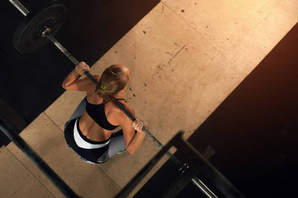 istock Top view - Strong Female training in the gym 1062129408