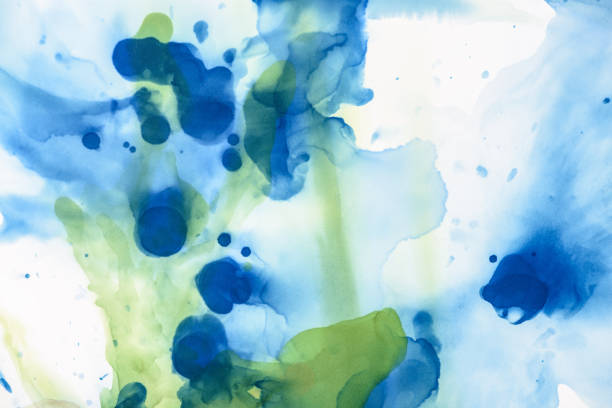 istock green and blue splashes of alcohol inks as abstract background 1062131592