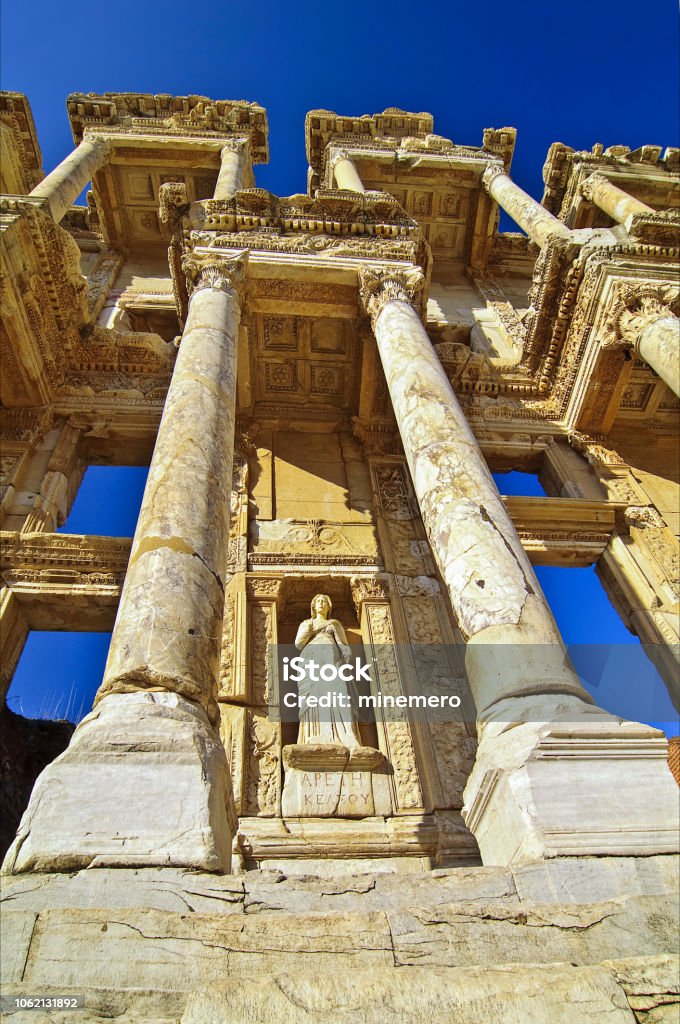 Ephesus  Celsus Library with Arete in Izmir, Turkey This library is one of the most beautiful structures in Ephesus. It was built in 117 A.D. It was a monumental tomb for Gaius Julius Celsus Polemaeanus, the governor of the province of Asia; from his son Galius Julius Aquila. Aegean Turkey Stock Photo