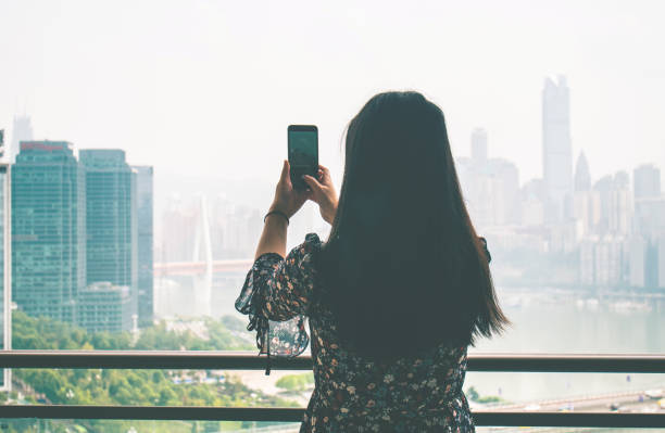istock Taking city photo with phone 1062134210