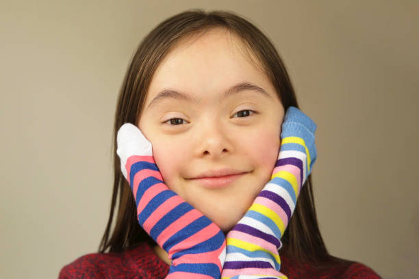 istock Beautiful girl smiling with socks 1062134444