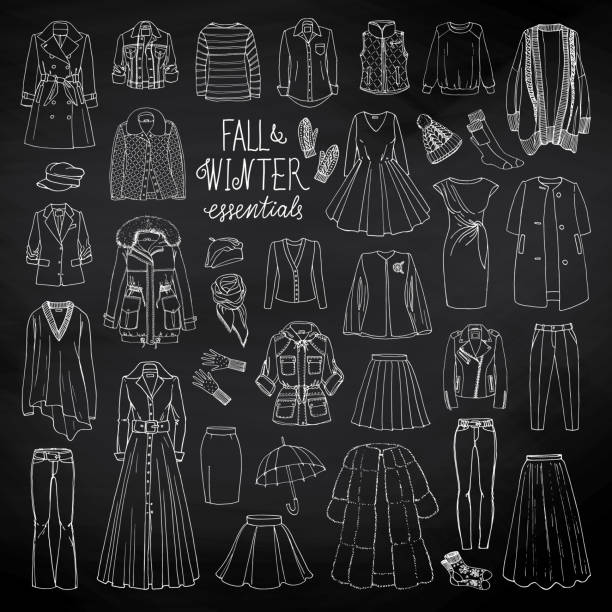 Fall and winter fashion collection Vector illustration set of women's fall and winter fashion clothes on blackboard. Coats, dresses, skirts, jackets, trousers, hats, gloves, socks. Black and white sketch. winter fashion collection stock illustrations