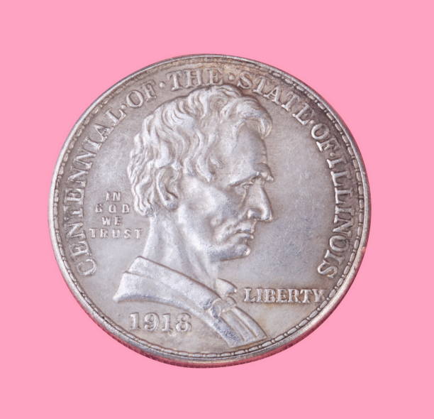 istock half dollar coin isolated on pink background 1062137846