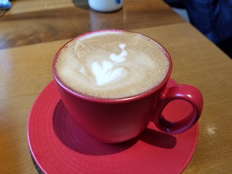 Close-up view of the red coffee cup on a table at Taproot, a sandwich place in the Mission Bay neighborhood of San Francisco, California, October 29, 2018