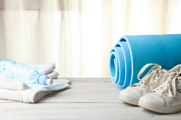 istock Gym mat, sneakers and water 1062146346