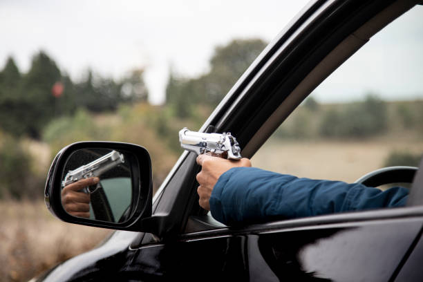 istock The polices are shooting through the car. 1062146350
