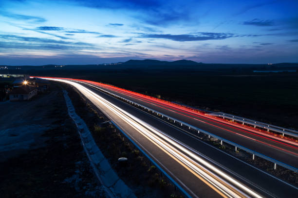 istock Car traffic on the highway 1062150484