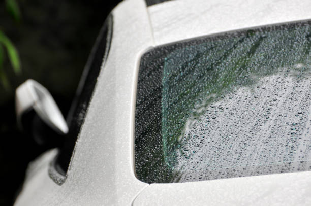 istock Raindrops on the rear window of car 1062152196