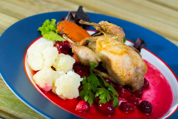 istock Grilled quail with sauce and vegetables 1062153980