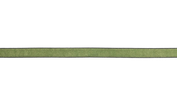 istock Background with green velvet ribbon on white background 1062164128