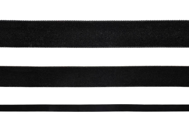 Background with black velvet ribbons on white background