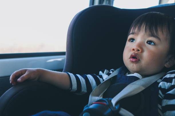 istock One boy stting in the car 1062165138