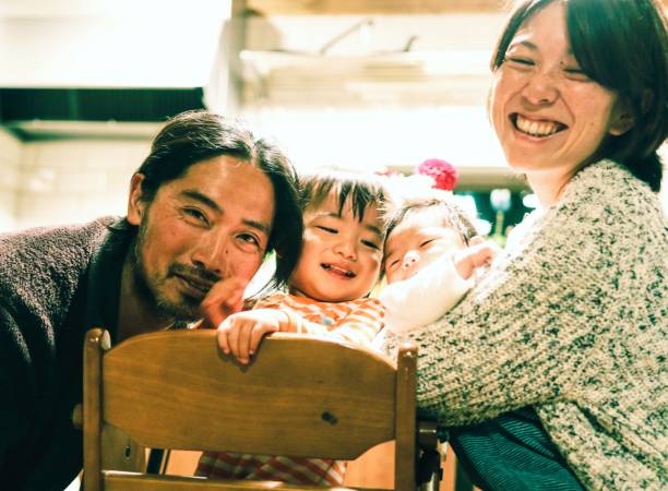 Japanese Family Japanese 4 families is enjoy their life at the home japanese ethnicity photos stock pictures, royalty-free photos & images