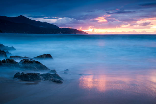 istock Sunset by the sea 1062167812