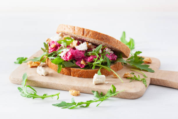 istock beetroot and feta cheese sandwich with walnuts and rocket 1062168284