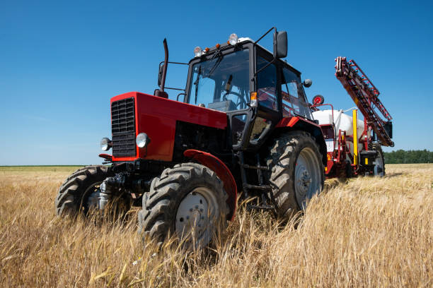 istock red tractor sprayer in the field 1062169982